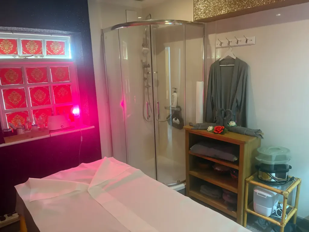 Ensuite shower area in a treatment room at May Thai Therapy